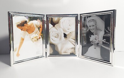 #ad FETCO 5quot; X 7quot; Holds Three Photo Openings HINGED Silverplated Photo Frame New. $14.99